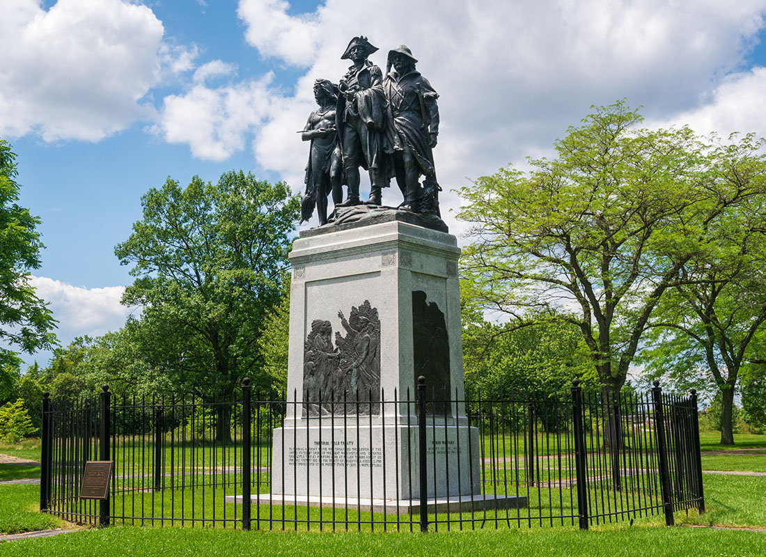 About Our Agency - Statue at Fallen Timbers Battlefield on a Sunny Day